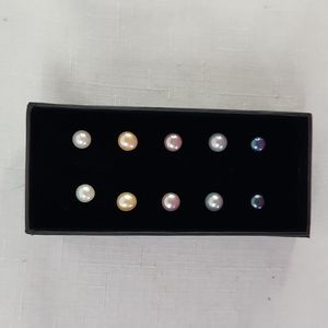 Lesa Michele 5 prs of colored earrings pirced.
